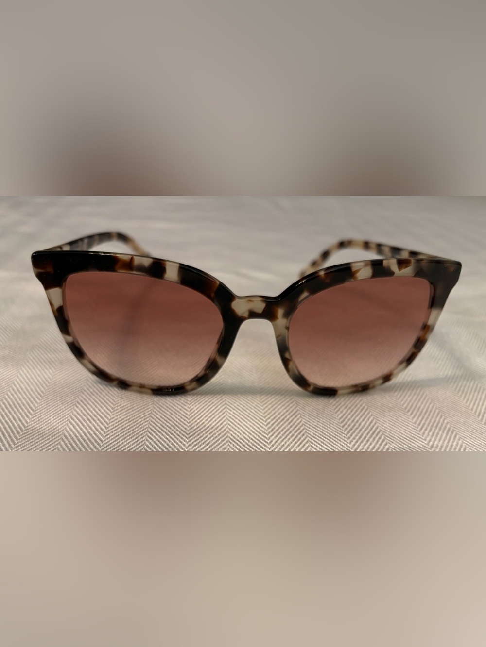 Prada Tortoise Shell Sunglasses with rose gradient tint. Case included.